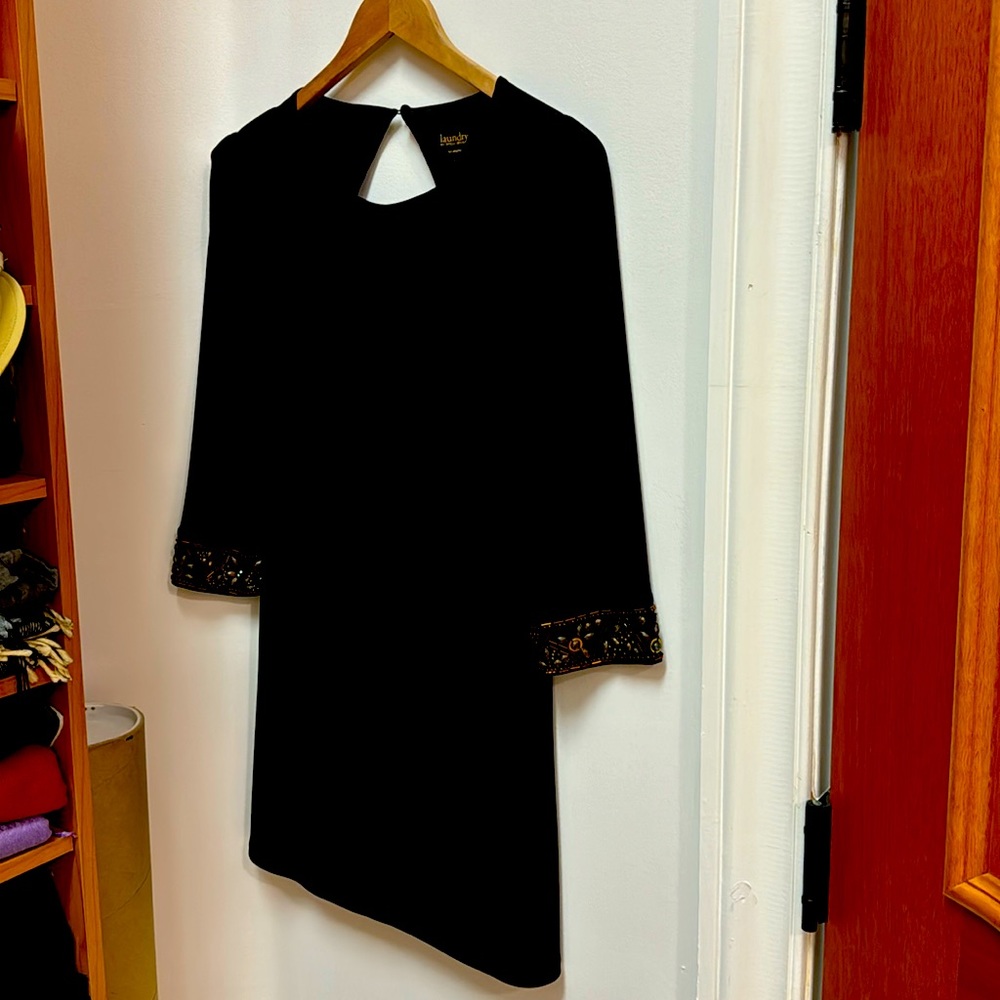 Black mini dress with embellished three quarter sleeves